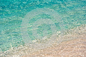 Azure water of the beach Playa Paradise of the island of Cayo Largo, Cuba. Close-up.