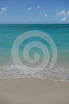 Azure water and blue sky on Grace Bay Beach in the Turks and Caicos