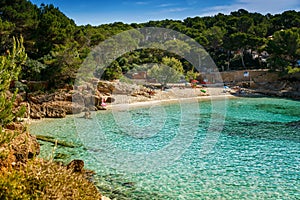 Azure waters and picturesque coastline in the Cala Gat beach, Mallorca