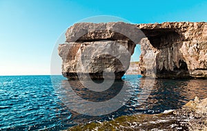 Azure Window, famous stone arch of Gozo island in the sun in summer, Malta