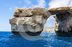 Azure Window in Gozo in blue summer waters