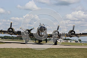 B-17 Bomber Starting up its Engines on the Runway