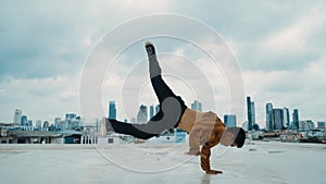 B-boy dance performance by professional street dancer at rooftop. hiphop.