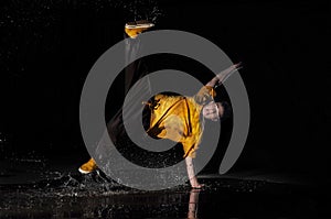 B-boy dances in water