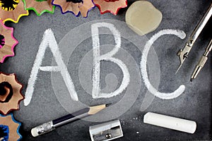 A B C letters and school stuff on blackboard
