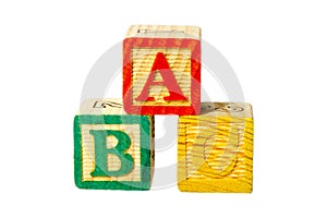 A, B and C wooden alphabet block isolate on a white background called ABC`s blocks uses for play in preschool as a toy