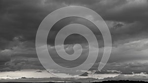 B Roll Timelapse Footage Sky and Black and White Cloud. black clouds moving fast in the dramatic sky. dark storm. Cloudy