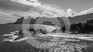 B&W aerial scene of Arpoador rock at Rio de Janeiro, spot to sunset contemplate