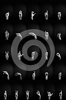 B&W image of hands demonstrating ASL sign language letters full alphabet A-Z with empty copy space