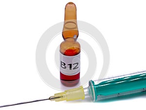 B12 ampoule with syringe isolated