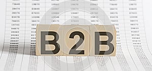 B2B abbreviation in letters on wooden cubes. Business or Busness concept