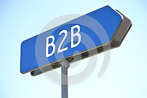 B2B - business to business - blue signpost, sky