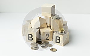 B2B , business to business marketing, business word on wooden cubes over blur background, banner