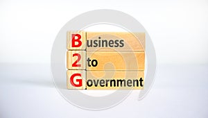 B2G business to government symbol. Concept words `B2G - business to government` on wooden blocks on a beautiful white background