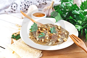 Baba ganoush - traditional arabian eggplant dip with flat bread