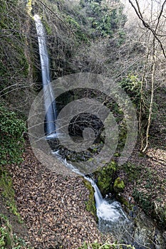 Babadag Yardan Waterfall. Yardan waterfall in mountain forest under blue sky. Babadag, Denizli, Turkey