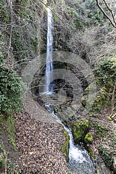 Babadag Yardan Waterfall. Yardan waterfall in mountain forest under blue sky. Babadag, Denizli, Turkey