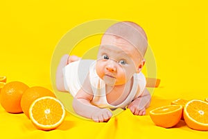 Babe lies in oranges