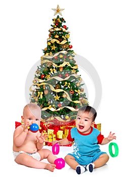 Babies and a Christmas Tree