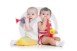 babies girls playing musical toys