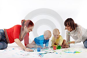 Babies painting with parents