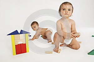 Babies Playing With Building Blocks