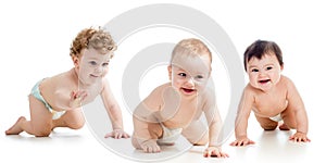 Babies wearing diaper crawling on floor