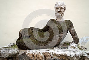 Antique Silenus statue on via del Babuino, Rome photo