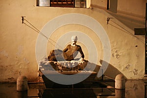 Babuino fountain with lying statue, Rome, Italy photo