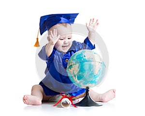 Baby in academician clothes with globe isolated