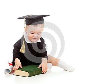 Baby in academician clothes with roll and book