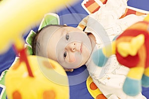 Baby on activity mat