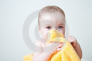 Baby After Bath Hiding Behind Yellow Towel