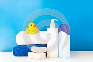 Baby bath products, baby care, Yellow rubber duck for bath games. Soap bubbles, bath foam, soap bubbles