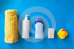 Baby bath products, baby care, Yellow rubber duck for bath games. Soap bubbles, bath foam, soap bubbles
