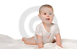 The baby on a bedsheet