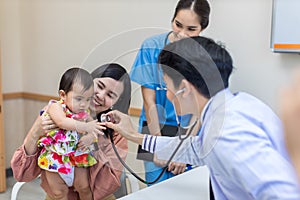 Baby being checked by a doctor using a stethoscope. Pediatrician doctor prepare for examines baby with stethoscope checking heart