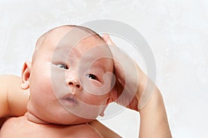 Baby being shampooed