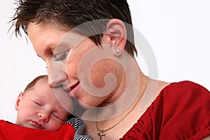 Baby being watch by loving mother