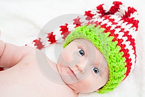 Baby With Big Eyes Wearing Cute Knit Hat