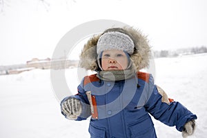 Baby blond boy winter outdoors