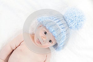 Baby with blue cap