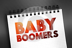 Baby boomers - demographic cohort following the Silent Generation and preceding Generation X, text concept on notepad