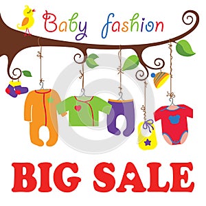 Baby born clothes hanging on the tree.Big sale