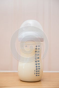 Baby bottle of powdered milk at home