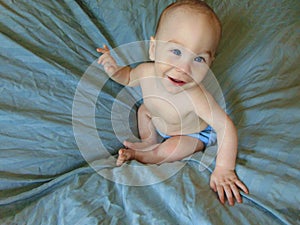 Baby Boy Against Blue Backdrop