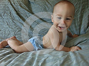 Baby Boy Against Blue Backdrop