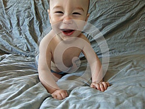 Baby Boy Against Blue Backdrop