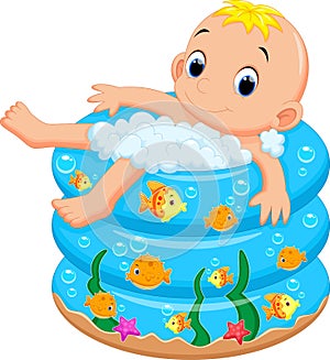 Baby boy bath in a bathtub with lot of soap