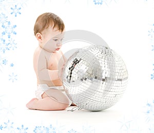 Baby boy with big disco ball